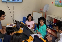 kids enjoying learning scratch coding