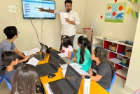 Kids learning scratch programming language at HappyCoders
